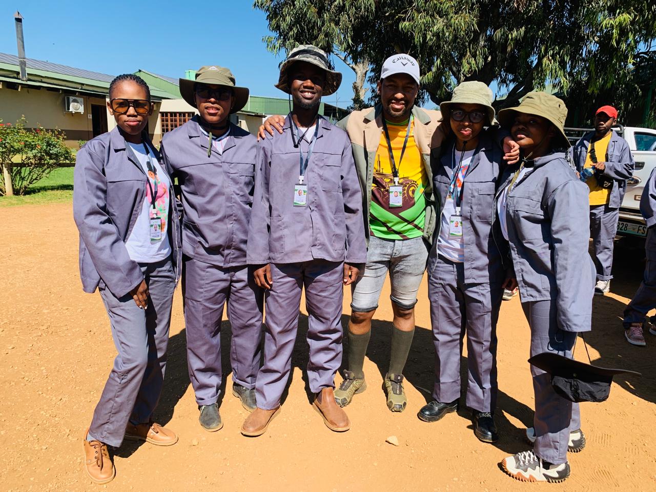 Ntate Motsamai with Team